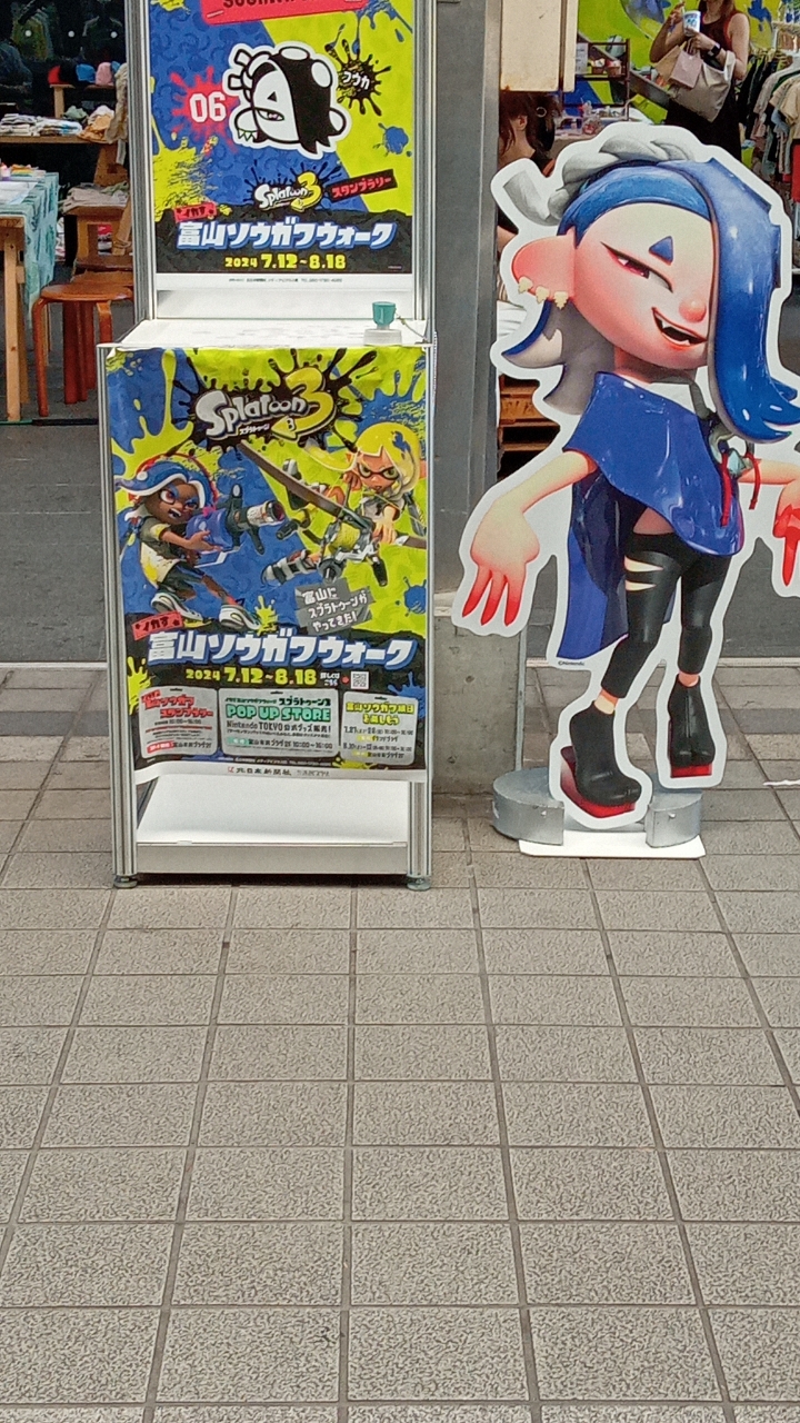 後ろでワークショップやってた